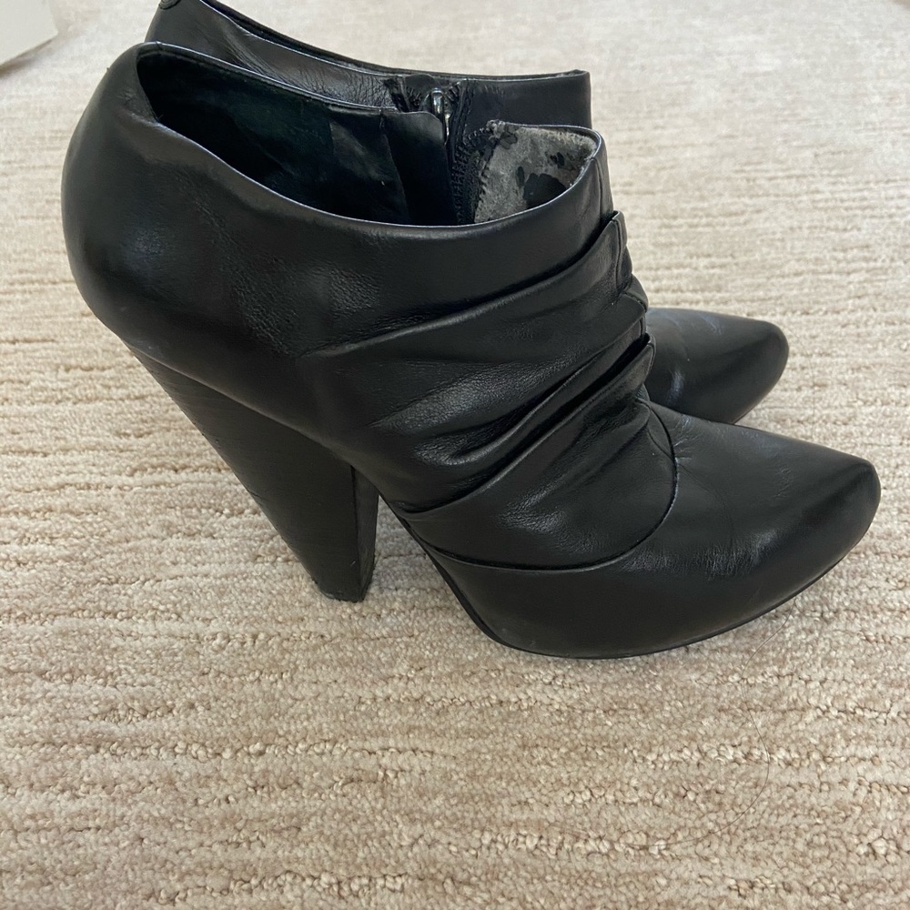 Jessica Simpsons black platform ankle booties